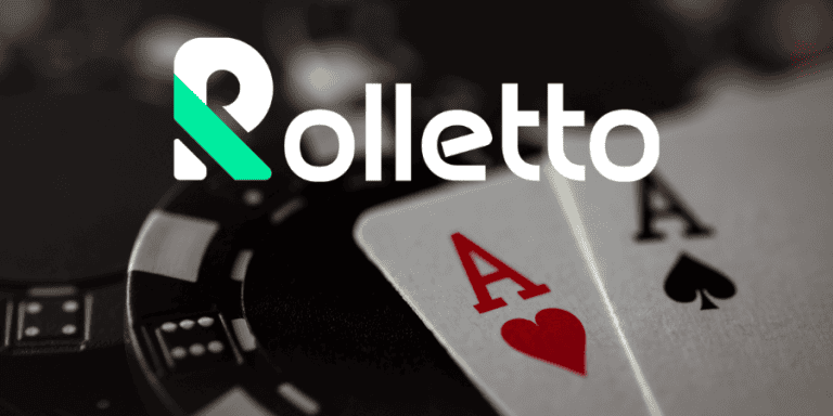 Aces and poker chips at a casino table.
